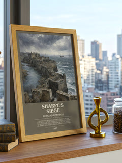 Sharpe's Siege Bookish Wall Art by Bernard Cornwell – framed print on a city-view windowsill