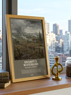 Sharpe's Waterloo Bookish Wall Art by Bernard Cornwell – framed print on a city-view windowsill