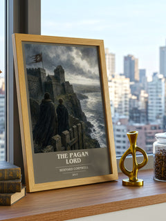 The Pagan Lord Book Cover Poster by Bernard Cornwell – framed print on a city-view windowsill