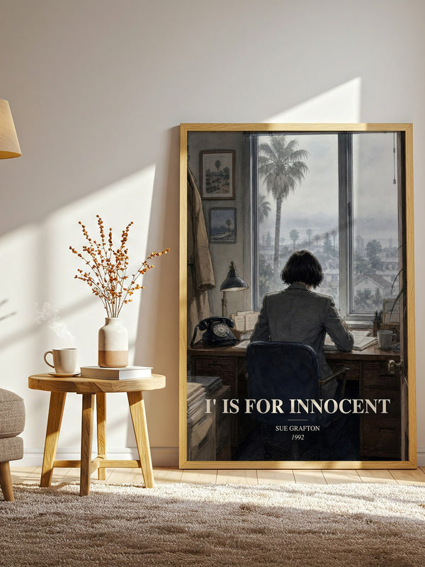 I' Is for Innocent watercolour print in frame leaning in hallway – mystery wall art