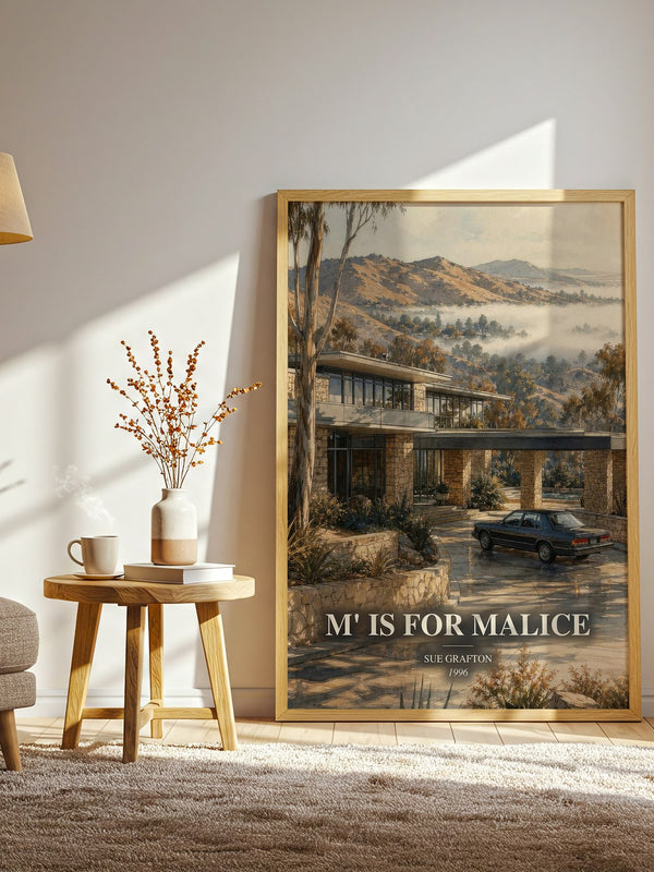 M' Is for Malice watercolour print in frame leaning in hallway – mystery wall art