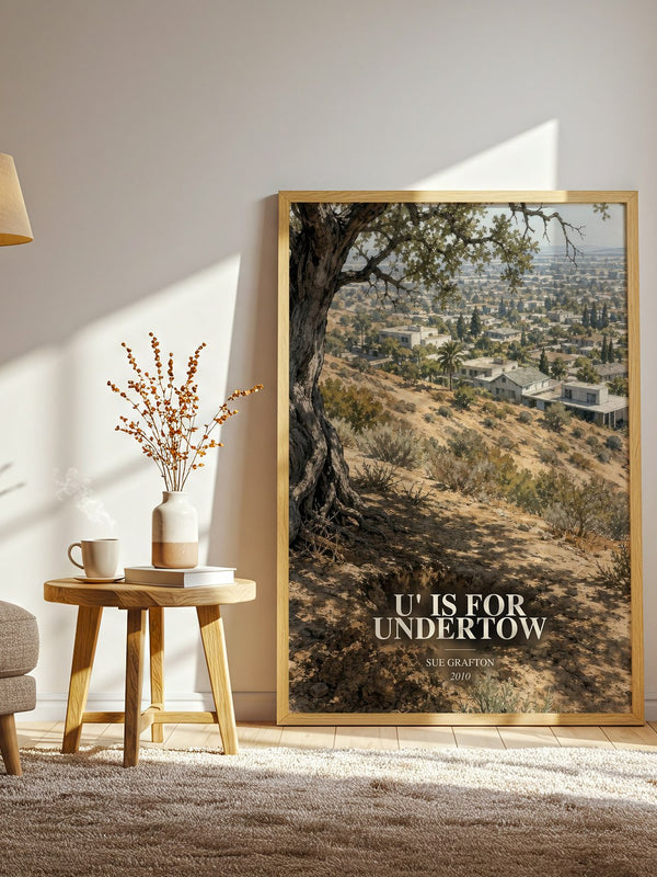U' Is for Undertow watercolour print in frame leaning in hallway – mystery wall art