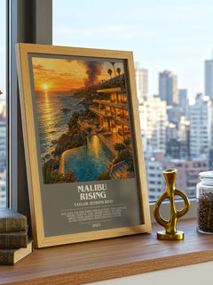 Malibu Rising Bookish Wall Art by Taylor Jenkins Reid – framed print on a city-view windowsill