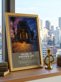 Maybe in Another Life Bookish Wall Art by Taylor Jenkins Reid – framed print on a city-view windowsill