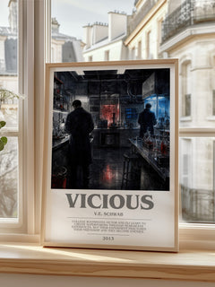 Vicious Bookish Wall Art by V.E. Schwab – framed print by a bright window