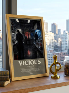 Vicious Bookish Wall Art by V.E. Schwab – framed print on a city-view windowsill