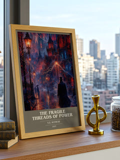 The Fragile Threads of Power book cover print framed by window – literary home decor