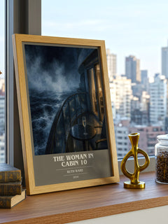 The Woman in Cabin 10 book cover print framed by window – literary home decor