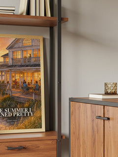 The Summer I Turned Pretty Book Watercolour Illustration by Jenny Han – framed print on a shelf by a wooden cabinet