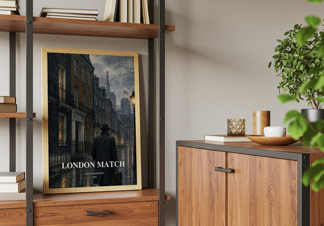 London Match Book Watercolour Illustration by Len Deighton – framed print on a shelf by a wooden cabinet