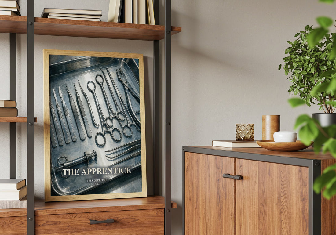 The Apprentice Book Watercolour Illustration by Tess Gerritsen – framed print on a shelf by a wooden cabinet