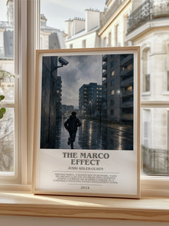 The Marco Effect Bookish Wall Art by Jussi Adler-Olsen – framed print by a bright window
