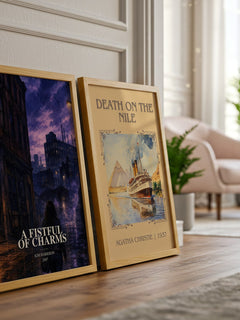 A Fistful of Charms Book Watercolour Illustration by Kim Harrison – framed print leaning beside a second print