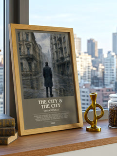 The City & the City Bookish Wall Art by China Miéville – framed print on a city-view windowsill