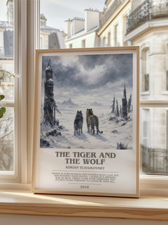 The Tiger and the Wolf Bookish Wall Art by Adrian Tchaikovsky – framed print by a bright window