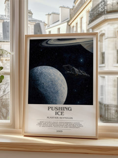 Pushing Ice Bookish Wall Art by Alastair Reynolds – framed print by a bright window