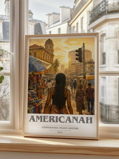 Americanah Book Cover Poster by Chimamanda Ngozi Adichie – framed print by a bright window