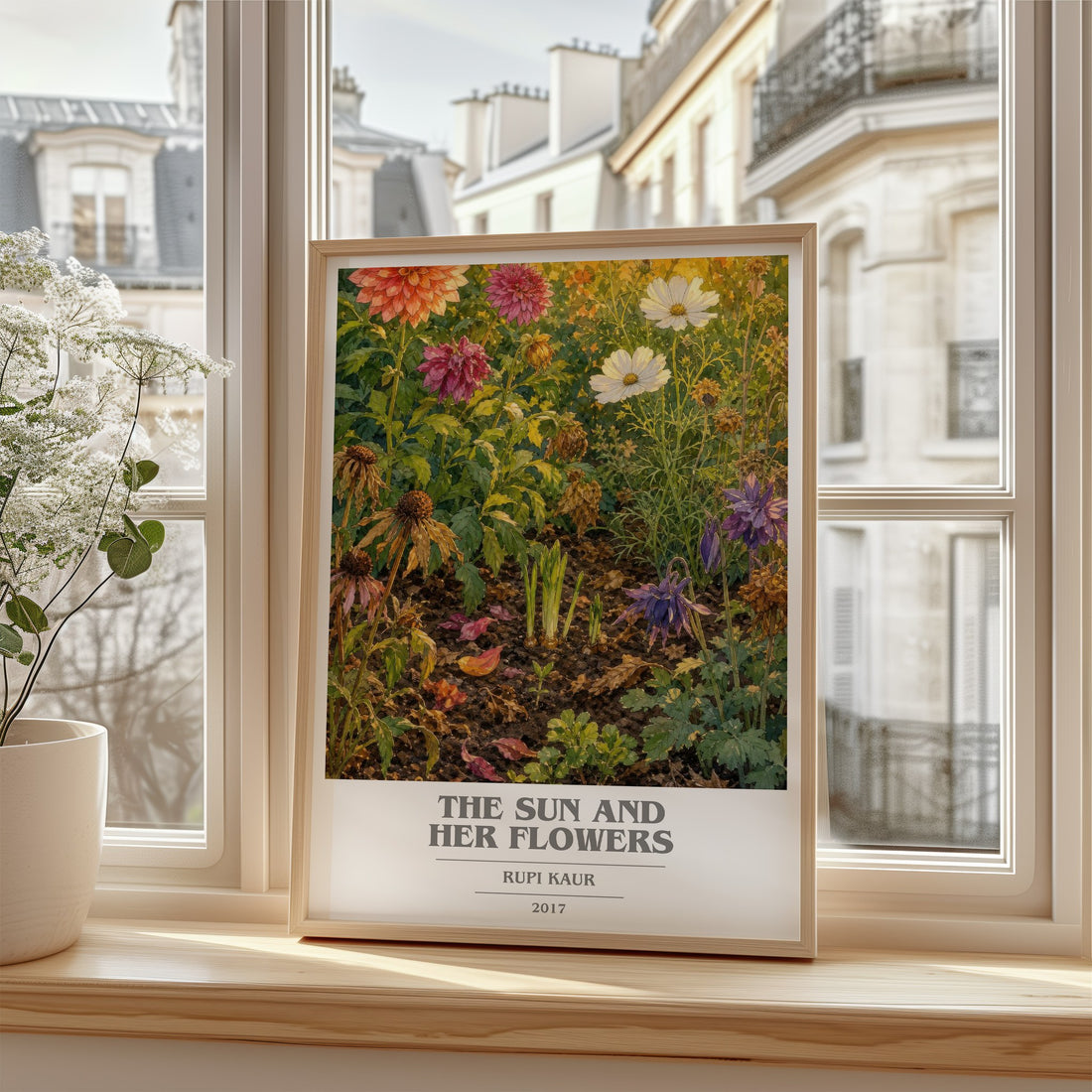the sun and her flowers Book Cover Poster by Rupi Kaur – framed print by a bright window