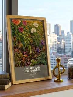 the sun and her flowers Book Cover Poster by Rupi Kaur – framed print on a city-view windowsill