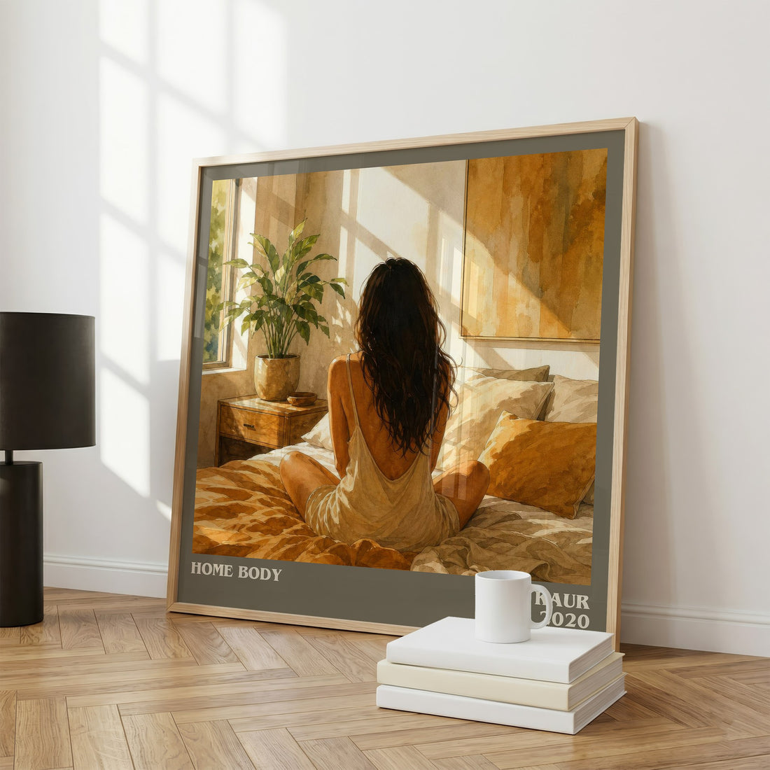 Home Body Literary Art Print by Rupi Kaur – large square framed print leaning against a wall