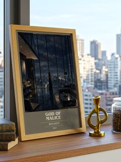 God of Malice book cover print framed by window – literary home decor