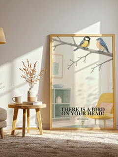 There is a bird on your head! watercolour print in frame leaning in hallway – childrens wall art