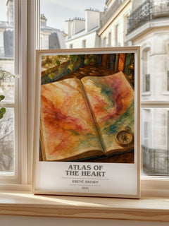 Atlas of the Heart Book Cover Poster by Brené Brown – framed print by a bright window