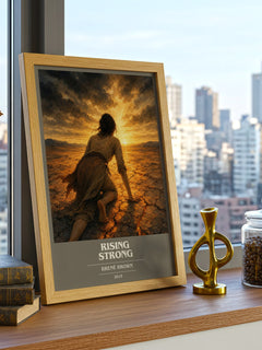 Rising strong book cover print framed by window – literary home decor