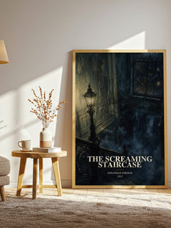 The Screaming Staircase watercolour print in frame leaning in hallway – young adult wall art