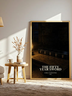 The fifty year sword watercolour print in frame leaning in hallway – horror wall art
