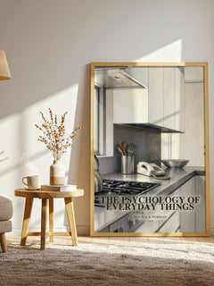 The Psychology of Everyday Things watercolour print in frame leaning in hallway – non fiction wall art