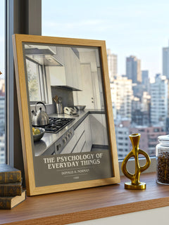 The Psychology of Everyday Things book cover print framed by window – literary home decor