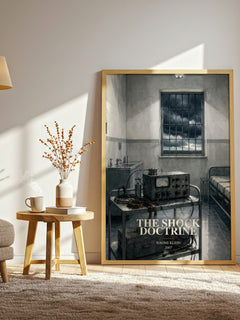 The Shock Doctrine watercolour print in frame leaning in hallway – non fiction wall art