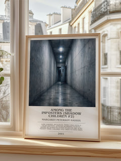 Among the Imposters (Shadow Children #2) Bookish Wall Art by M. Haddix – framed print by a bright window