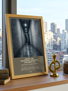 Among the Imposters (Shadow Children #2) Bookish Wall Art by M. Haddix – framed print on a city-view windowsill