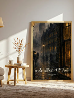 The 50 Greatest Mysteries of All Time watercolour print in frame leaning in hallway – mystery wall art
