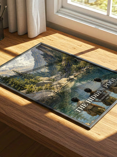 The Hidden Pool watercolour book poster framed on wall – coming of age wall art