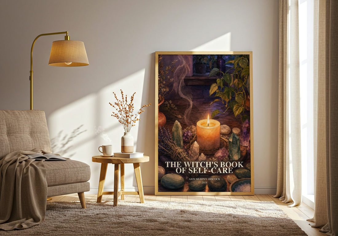 The Witch's Book of Self-Care watercolour print in frame leaning in hallway – non fiction wall art
