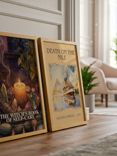 The Witch's Book of Self-Care watercolour print framed by window – literary home decor
