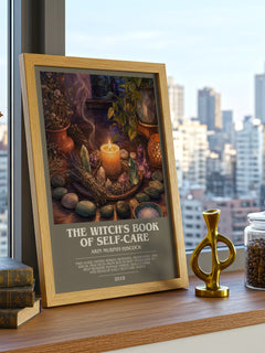 The Witch's Book of Self-Care bookish print framed by window – literary home decor