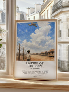 Empire of the Sun Bookish Wall Art by J. G. Ballard – framed print by a bright window
