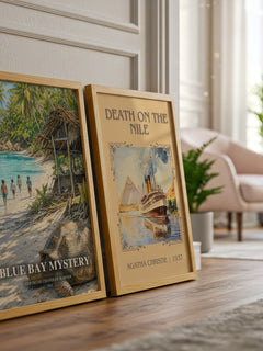 Blue Bay Mystery watercolour print framed by window – literary home decor
