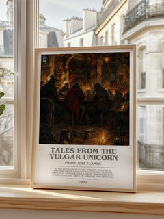 Tales from the Vulgar Unicorn Bookish Wall Art by Philip José Farmer – framed print by a bright window