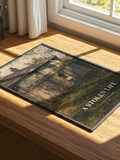 A Stolen Life watercolour book poster framed on wall – memoir wall art