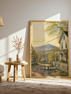 Our town watercolour print in frame leaning in hallway – literary fiction wall art