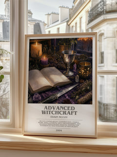 Advanced Witchcraft Bookish Wall Art by Edain McCoy – framed print by a bright window