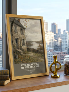 Five quarters of the orange book cover print framed by window – literary home decor