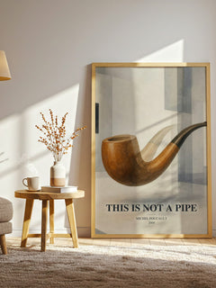 This Is Not a Pipe watercolour print in frame leaning in hallway – philosophy wall art