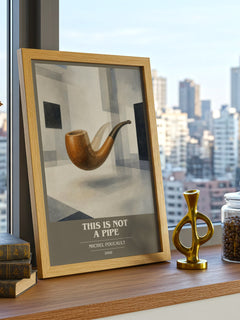 This Is Not a Pipe book cover print framed by window – literary home decor
