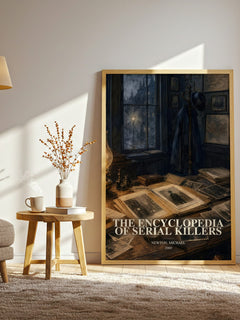 The encyclopedia of serial killers watercolour print in frame leaning in hallway – non fiction wall art